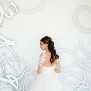 Woman Getting Married infront of the white wall at the W Hotel Dubai Palm Jumeirah