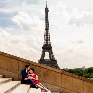 A photograph of wedding couple near the Eiffel Tower by Chandan Sojitra