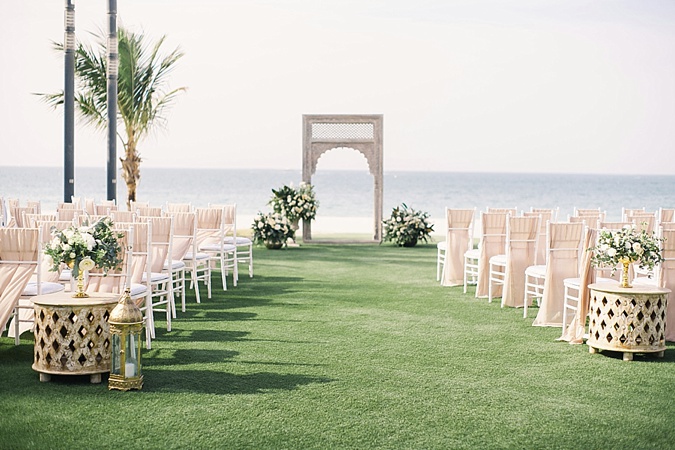 Outdoor wedding blessing by the beach. 