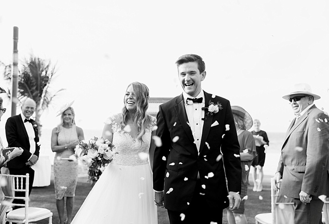 Bride and Groom walking down the aisle. 