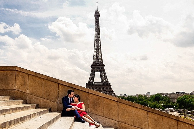 Couple in Paris with the Eifel tower in the background, captured by wedding photographer Chndan Sojitra