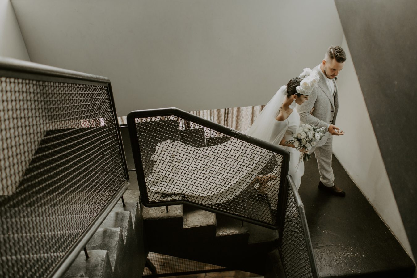 Khatia and Andrew walking down the stairs 