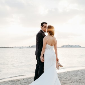 A beautiful wedding couple on the beach by Elizabet_Mitova_Photography